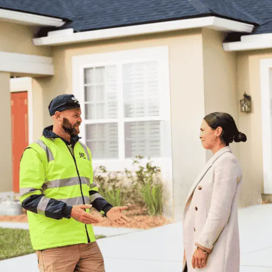 Battery installer leads – trusted installer talking to homeowner
